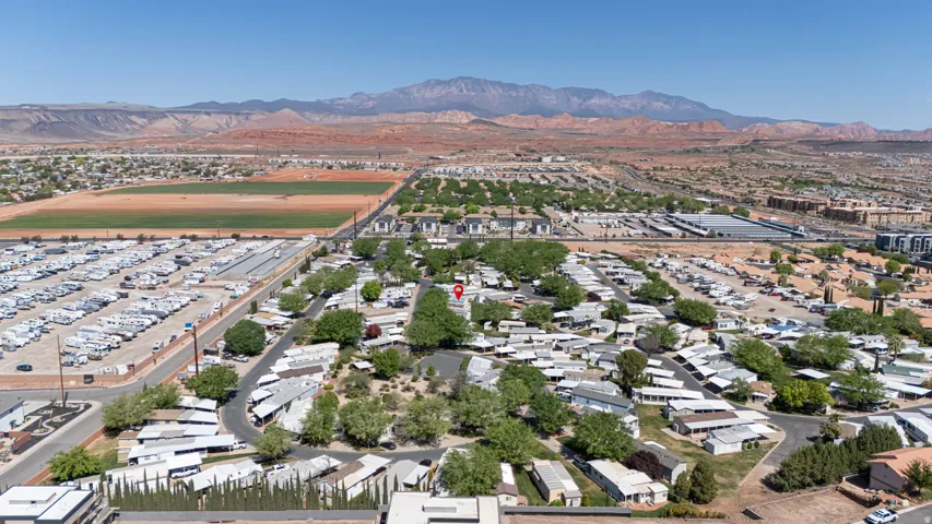 Aerial perspective of community with mountains