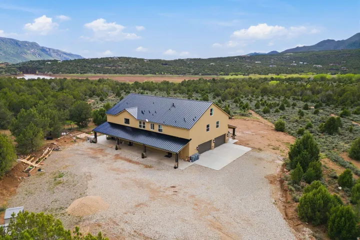 View of subject property featuring a mountain backdrop
