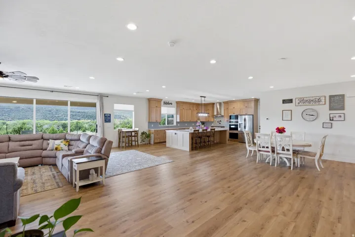 Living room with light wood-type flooring