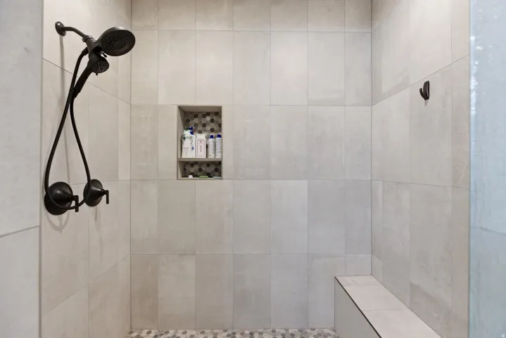Full bathroom featuring tiled shower