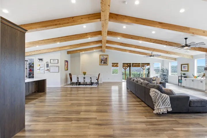 Living area featuring recessed lighting and light wood finished floors