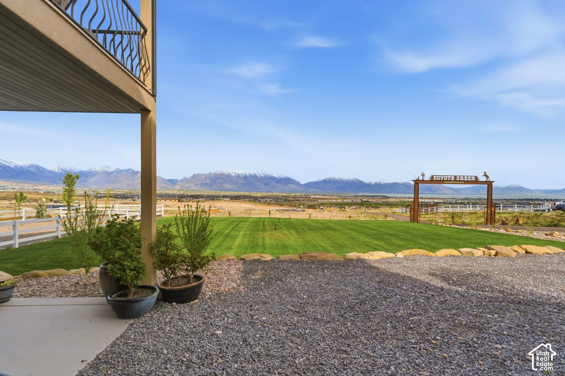 View of yard with a mountain view and a patio area