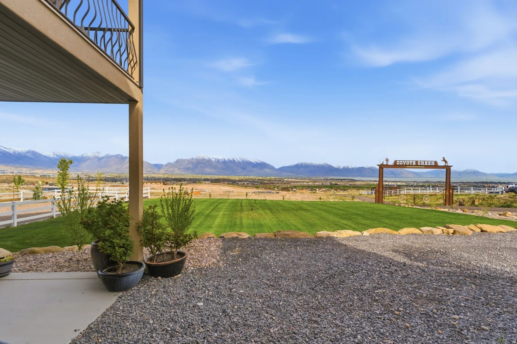 View of yard with a mountain view and a patio area
