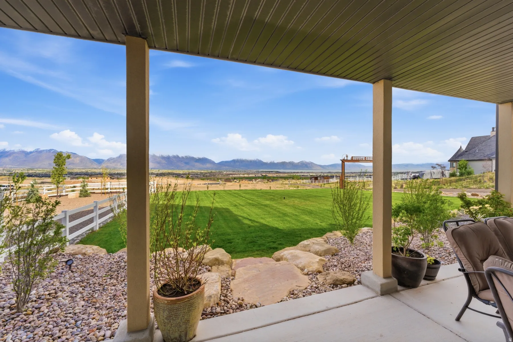 View of patio with a mountain view and a view of countryside