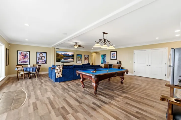 Game room featuring recessed lighting, arched walkways, pool table, crown molding, and ceiling fan