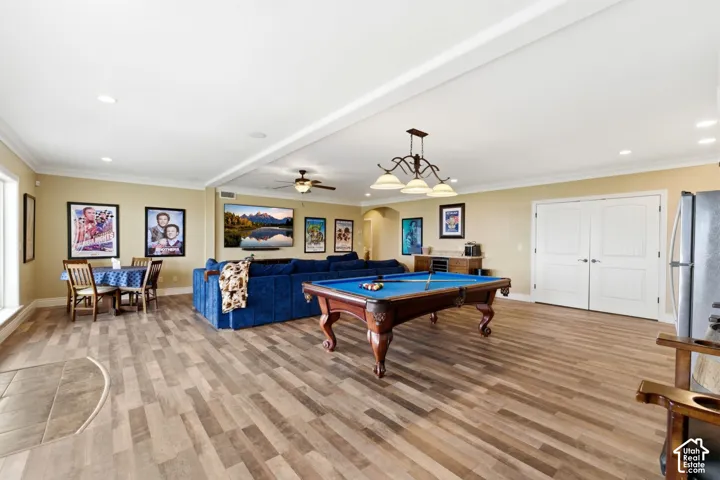 Game room featuring recessed lighting, arched walkways, pool table, crown molding, and ceiling fan