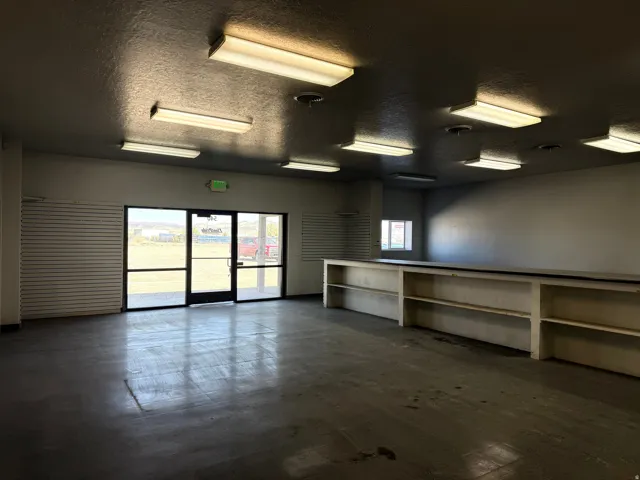 Empty room featuring a textured ceiling