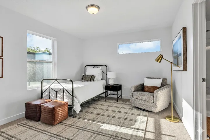 Bedroom featuring baseboards