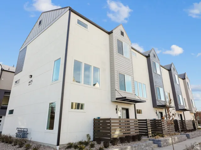 View of side of property featuring board and batten siding