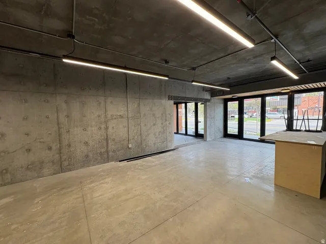 Unfurnished room with concrete floors