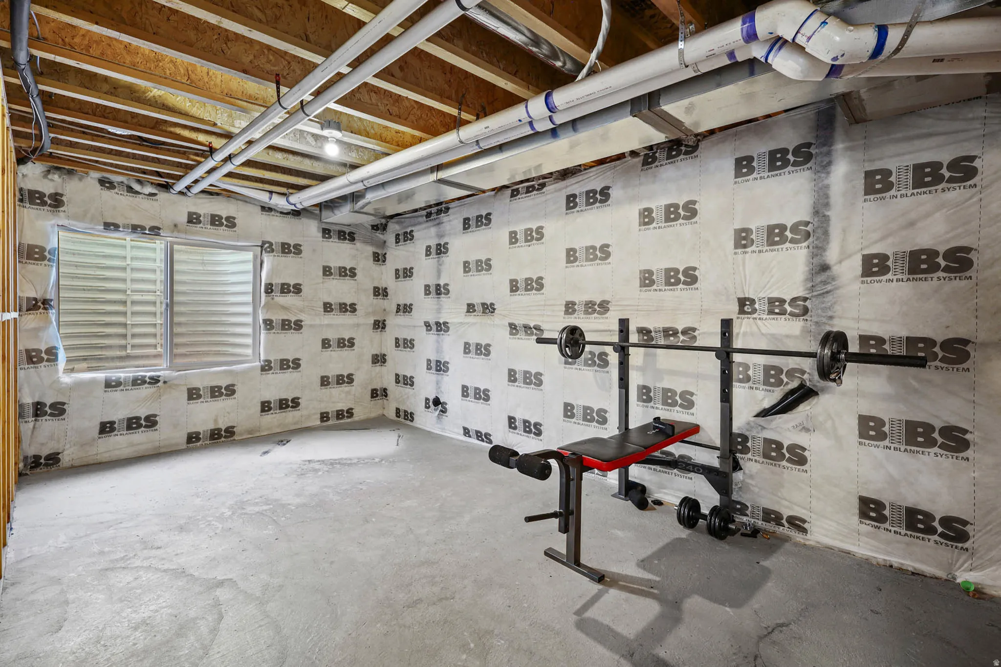 Exercise area featuring concrete flooring