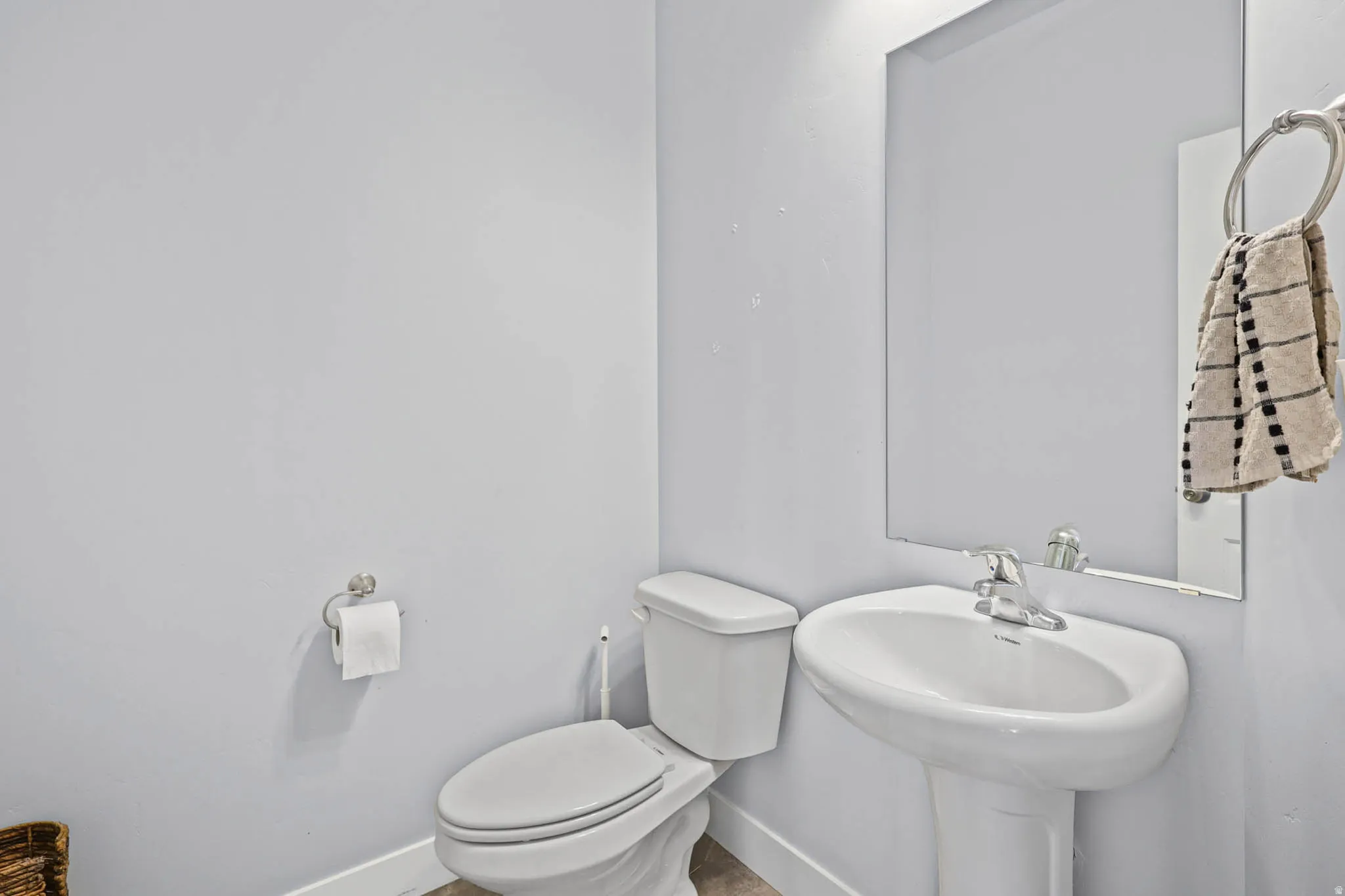 Half bathroom on main level off the kitchen