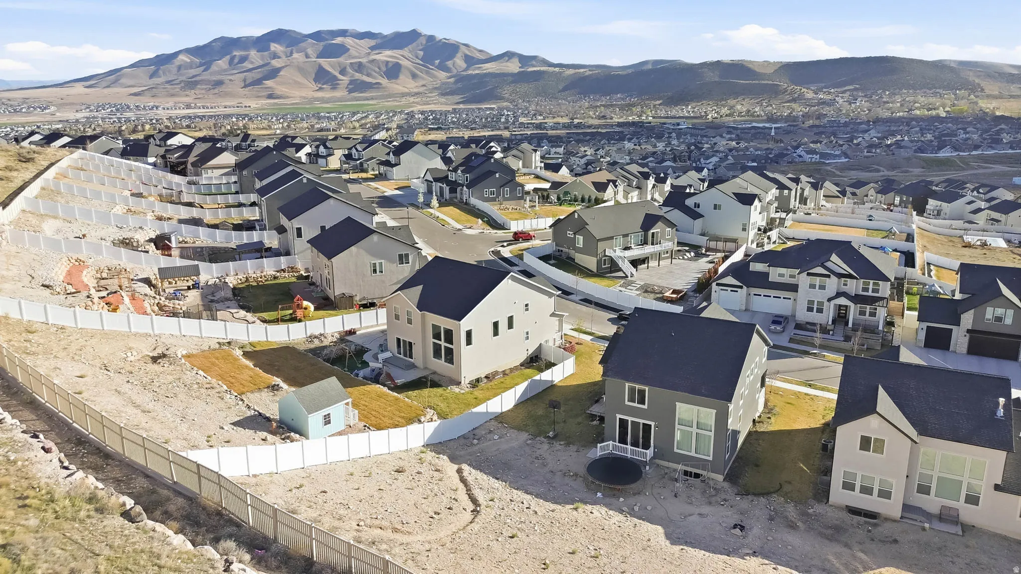 Aerial perspective of suburban area with mountains