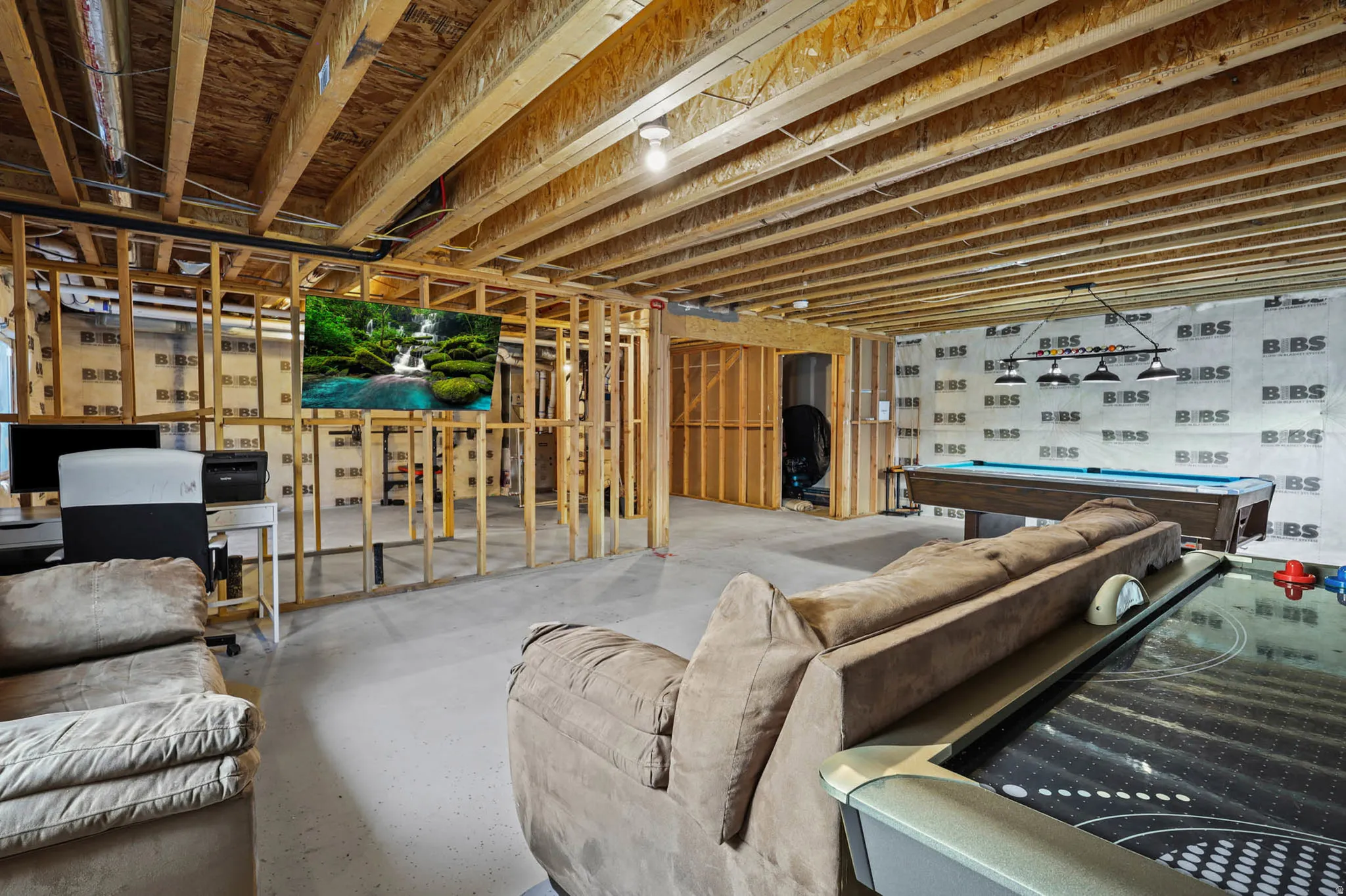 Unfinished basement featuring pool table