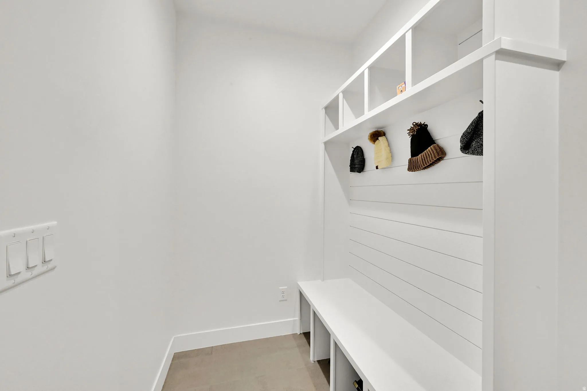 Mudroom featuring baseboards
