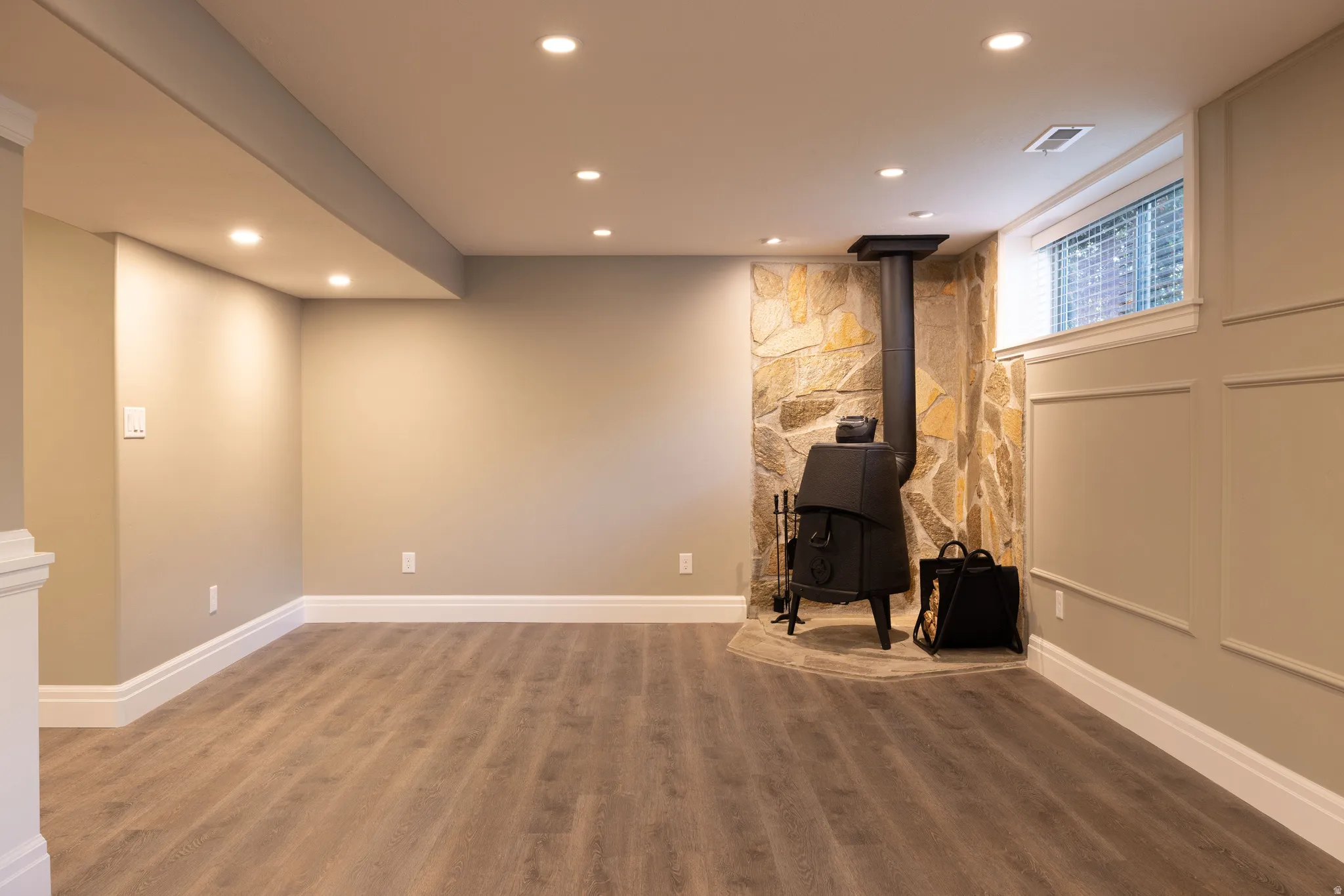 Basement featuring wood finished floors and recessed lighting