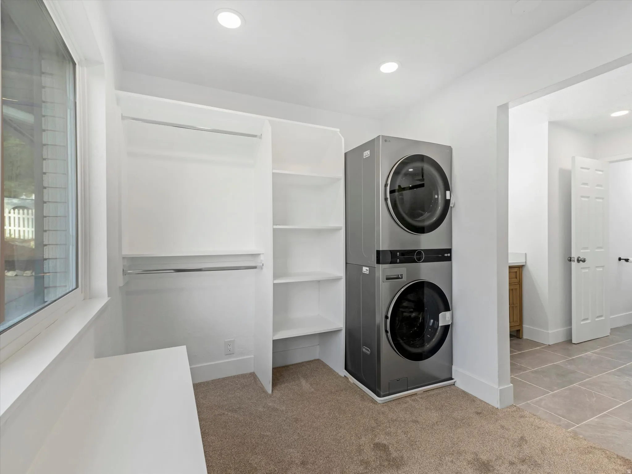 Upstairs Master Walk in closet with laundry