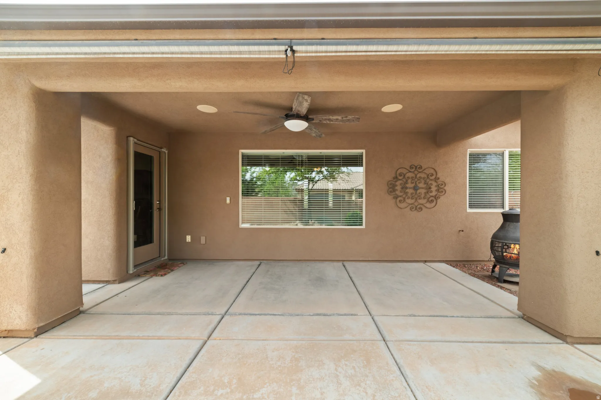View of patio / terrace featuring ceiling fan