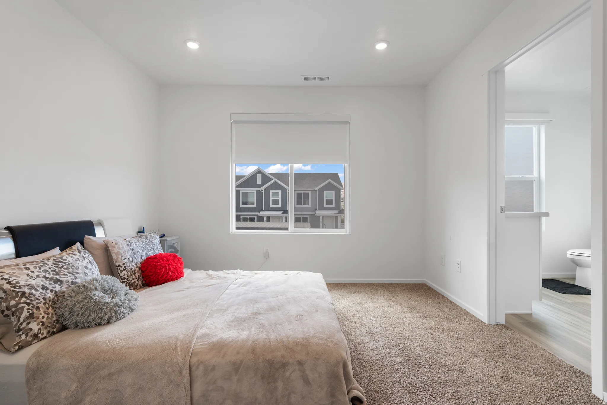 Bedroom with carpet and recessed lighting