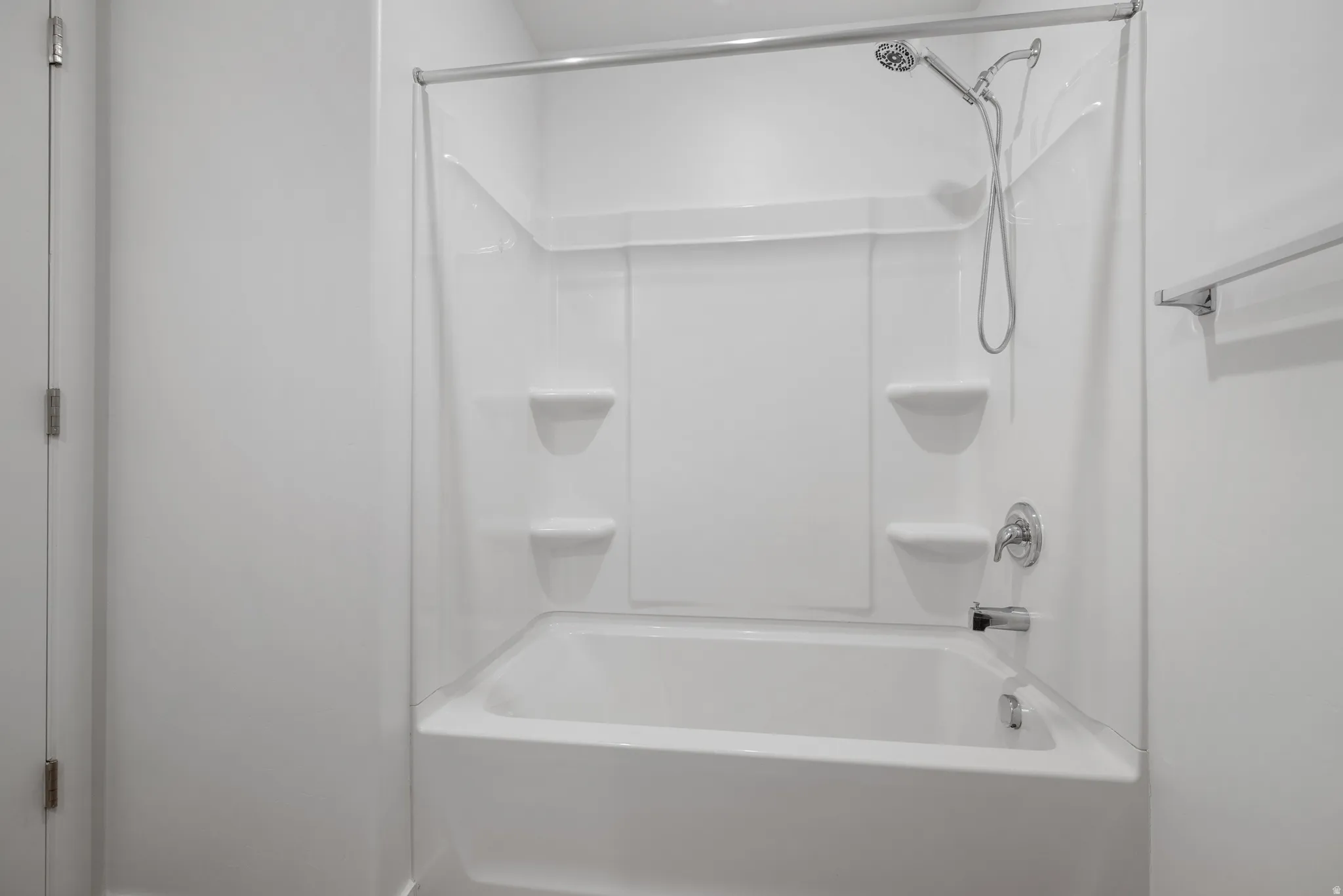 Bathroom featuring shower / tub combination