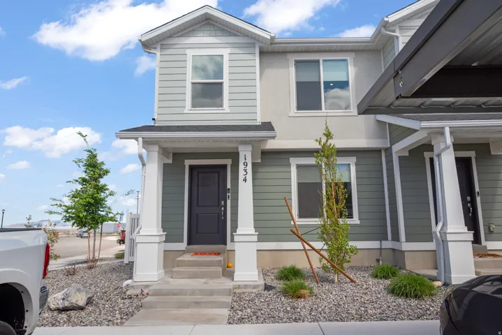 View of front of home featuring stucco siding