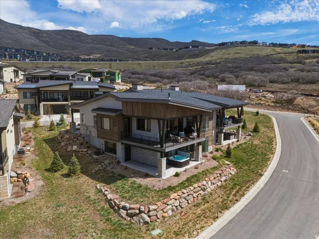 View from above of property with a mountainous background