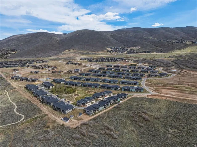 Aerial view of residential area with mountains