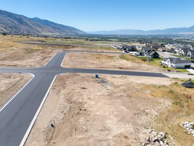 View of mountain background featuring nearby suburban area