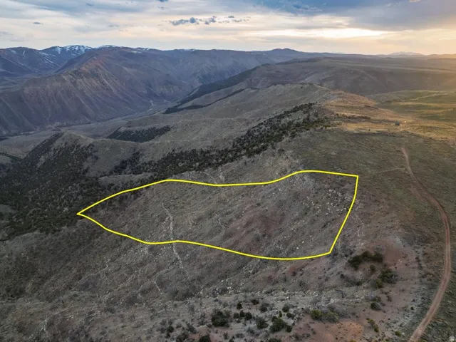 Drone / aerial view of a mountain backdrop