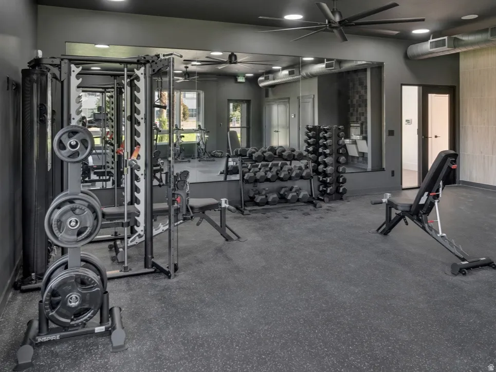 Exercise room featuring a ceiling fan
