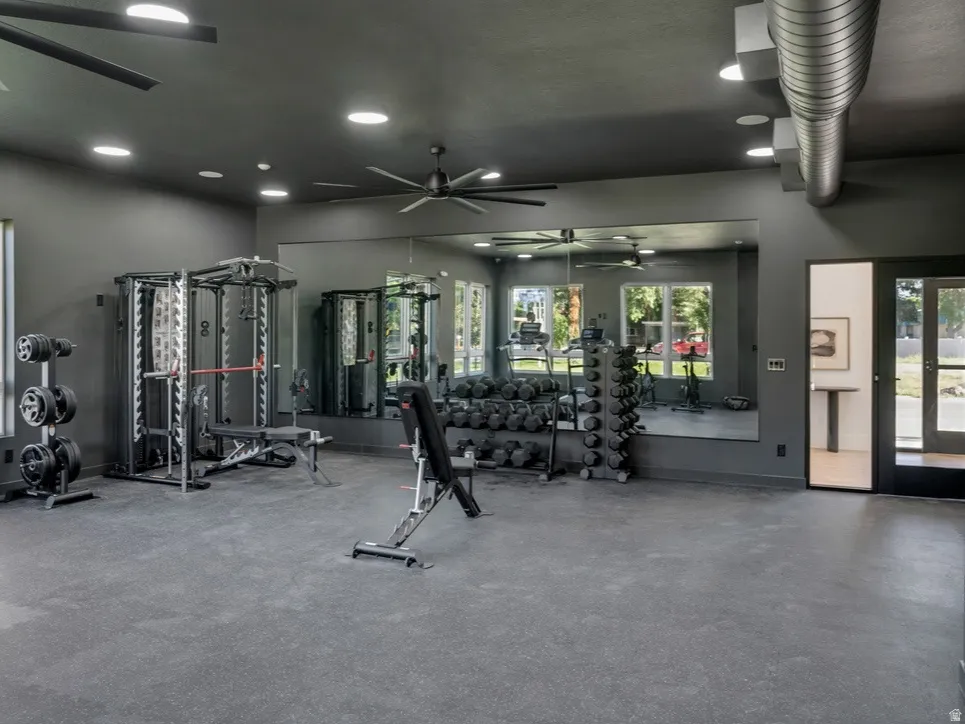 Workout area featuring ceiling fan