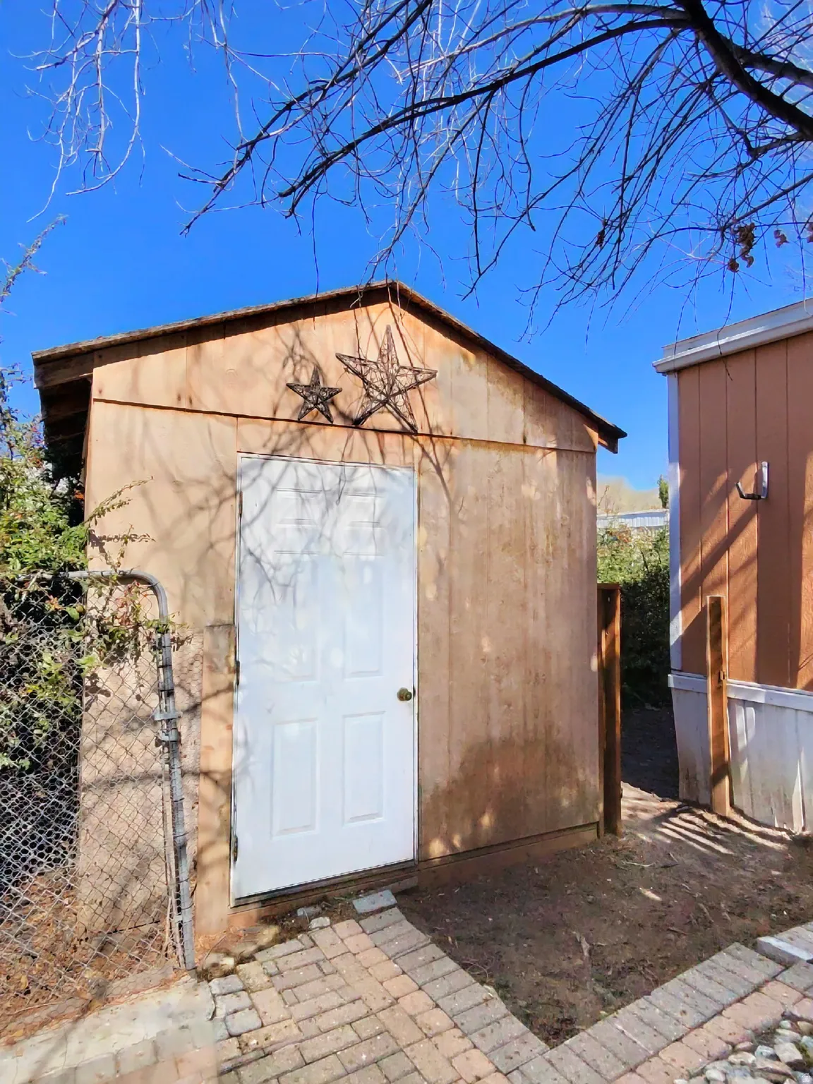 View of shed on East side of home