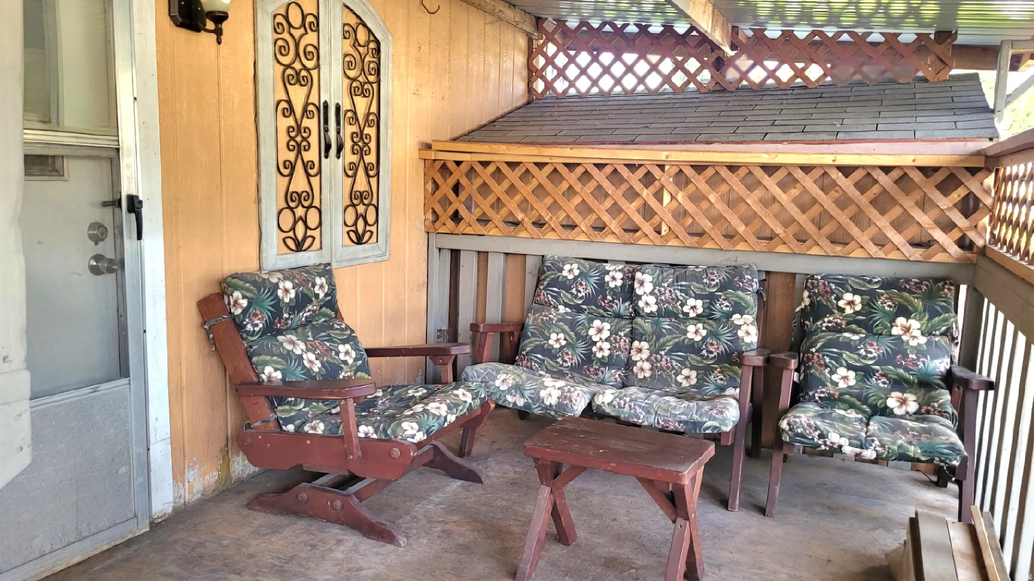 View of back deck by covered parking