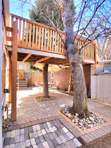 View of patio / terrace with outdoor dining space and a deck