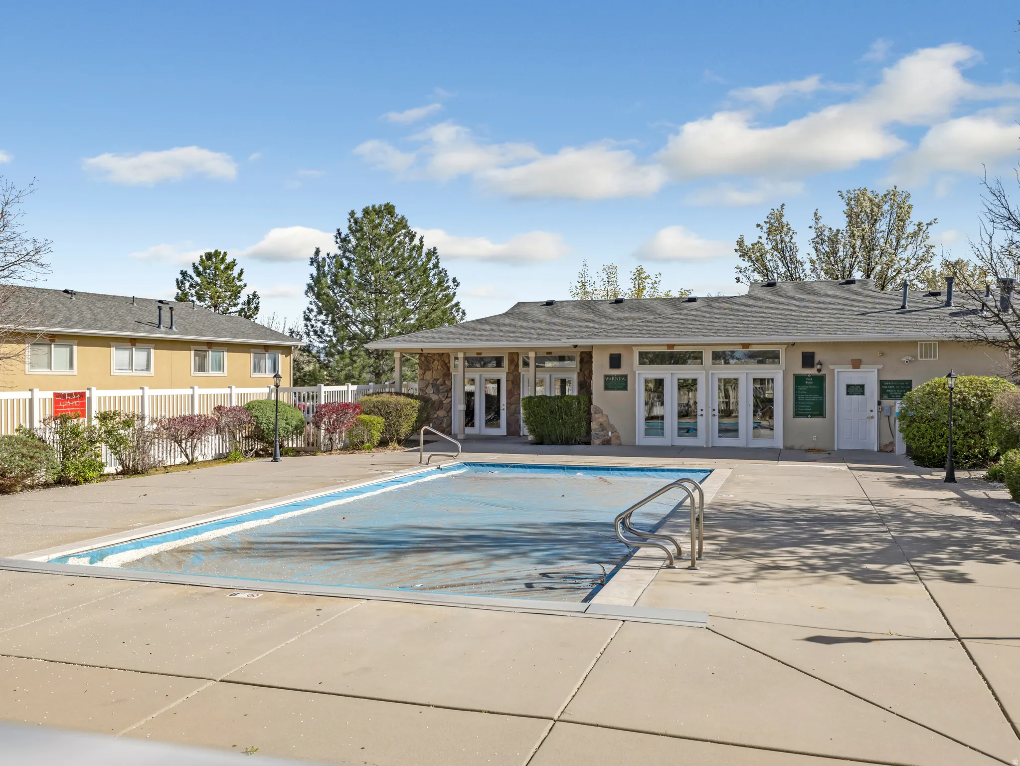 Community pool with french doors