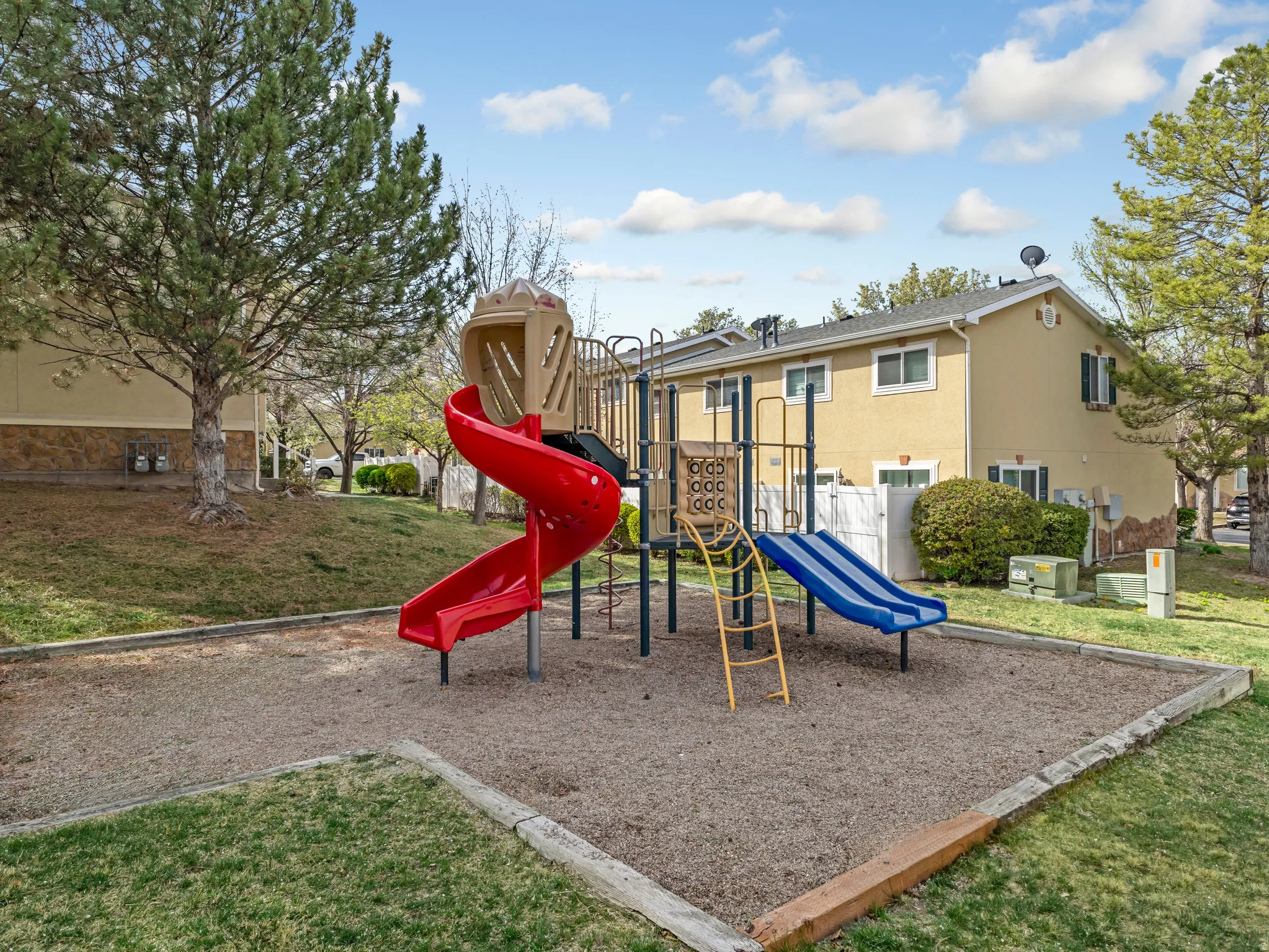 Community playground with a yard
