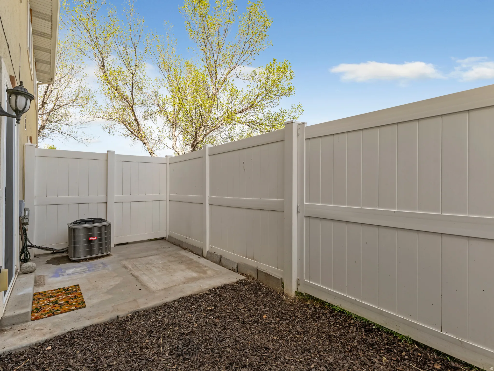 Fenced yard with a patio