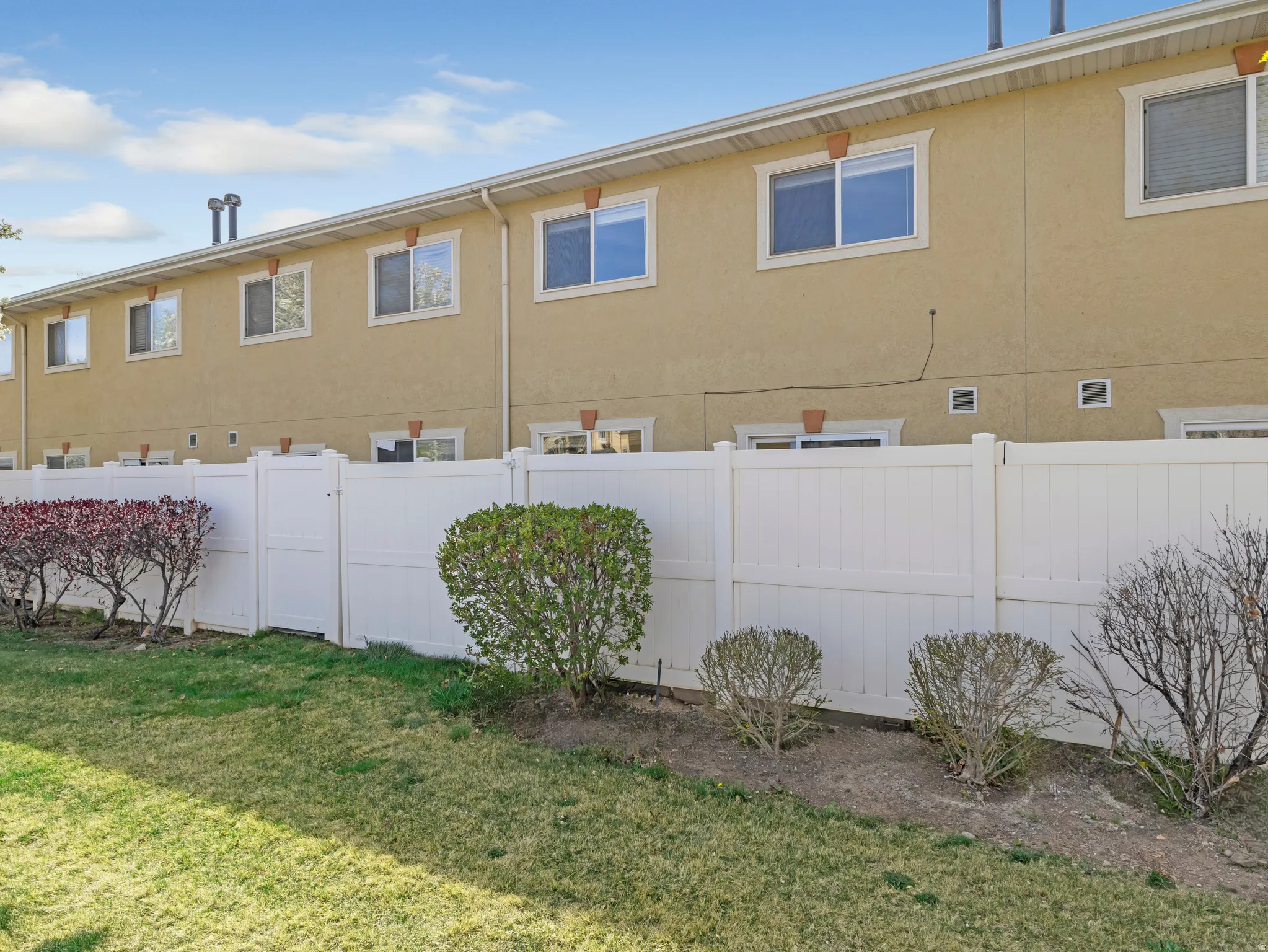 View of property exterior with stucco siding
