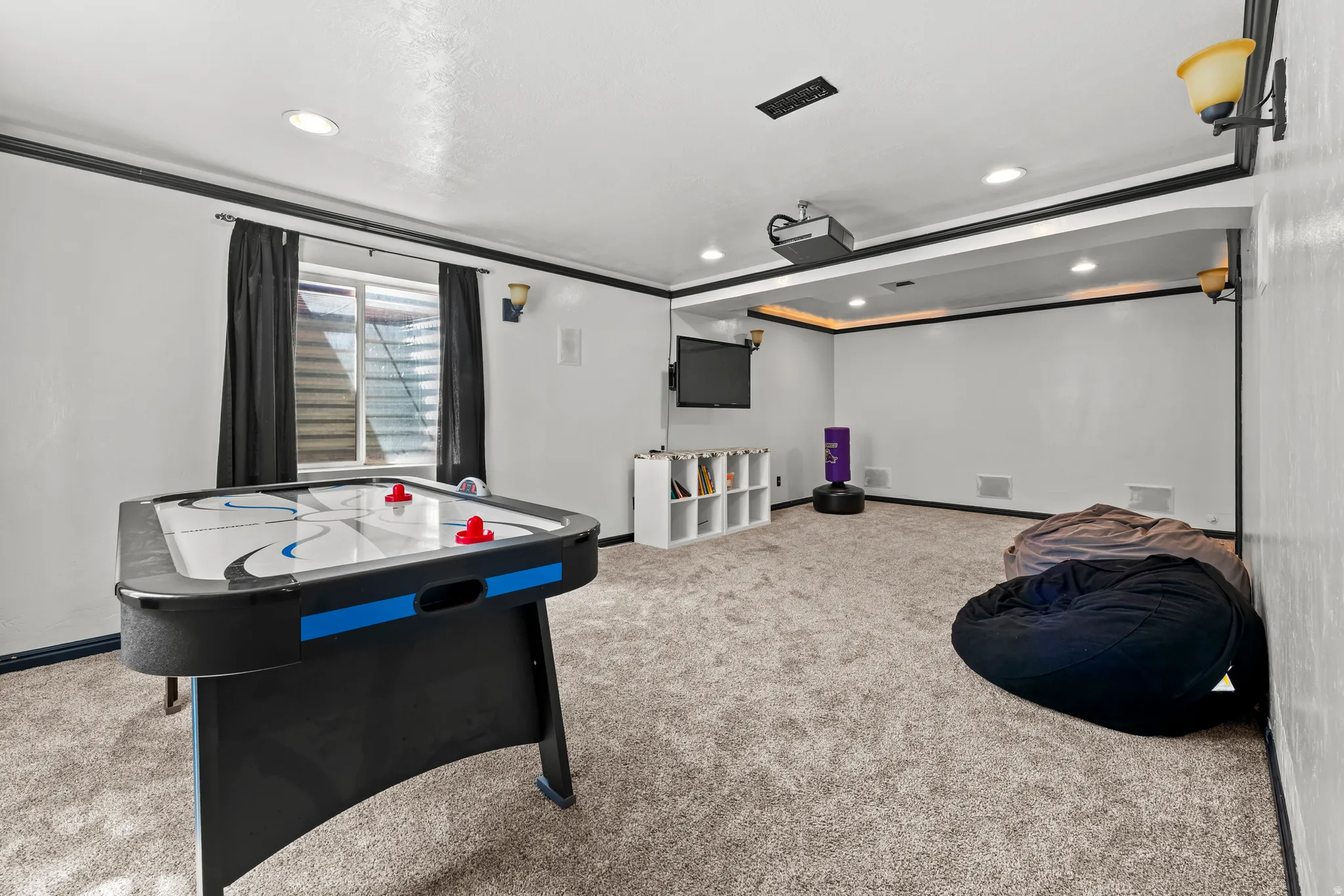 Game room / former theater room. Projector is included.