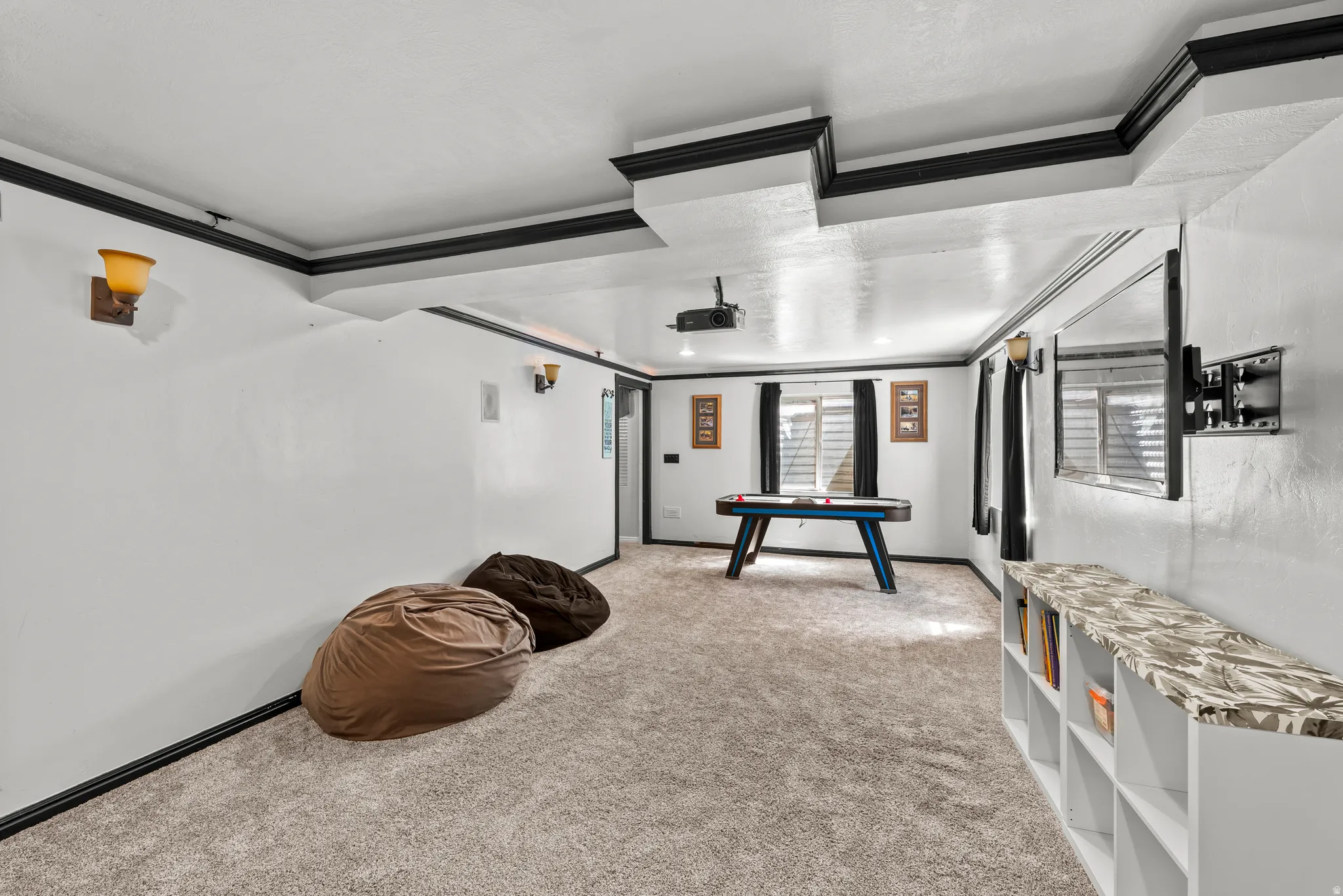 Game room / former theater room. Projector is included.