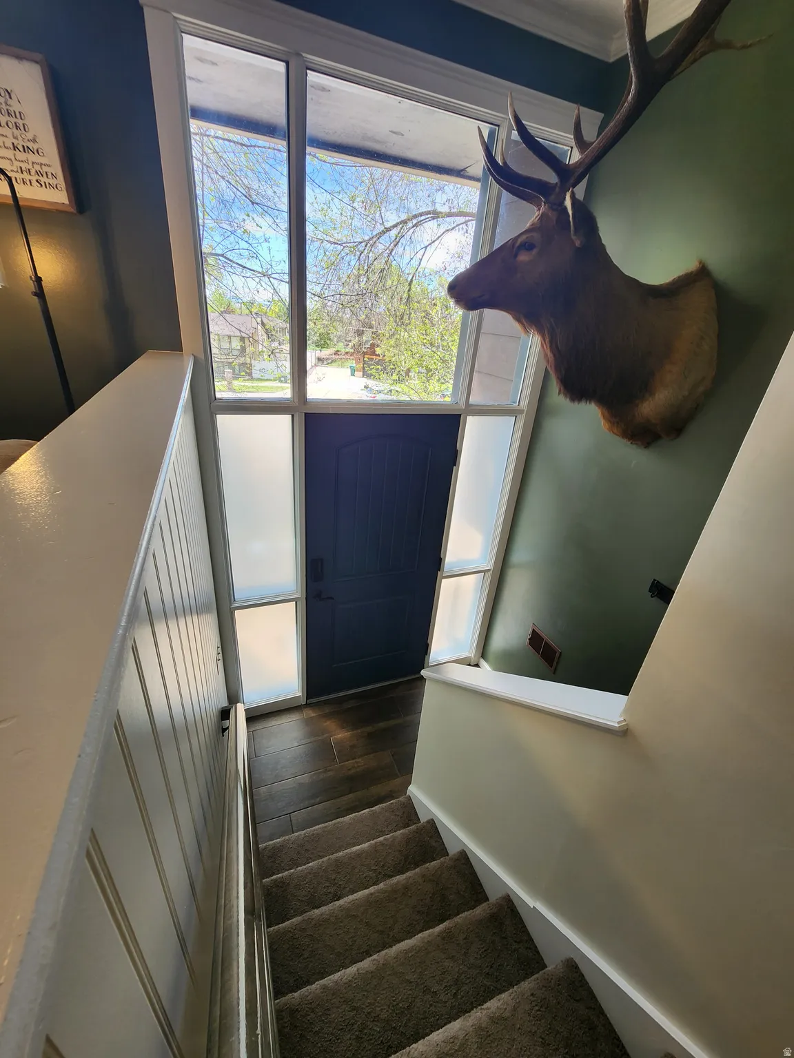 Staircase with wood finished floors