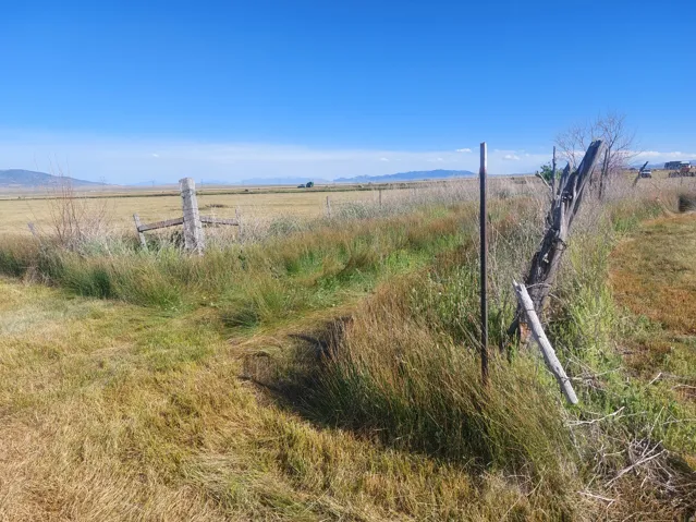 View of yard featuring a view of countryside and a mountain view