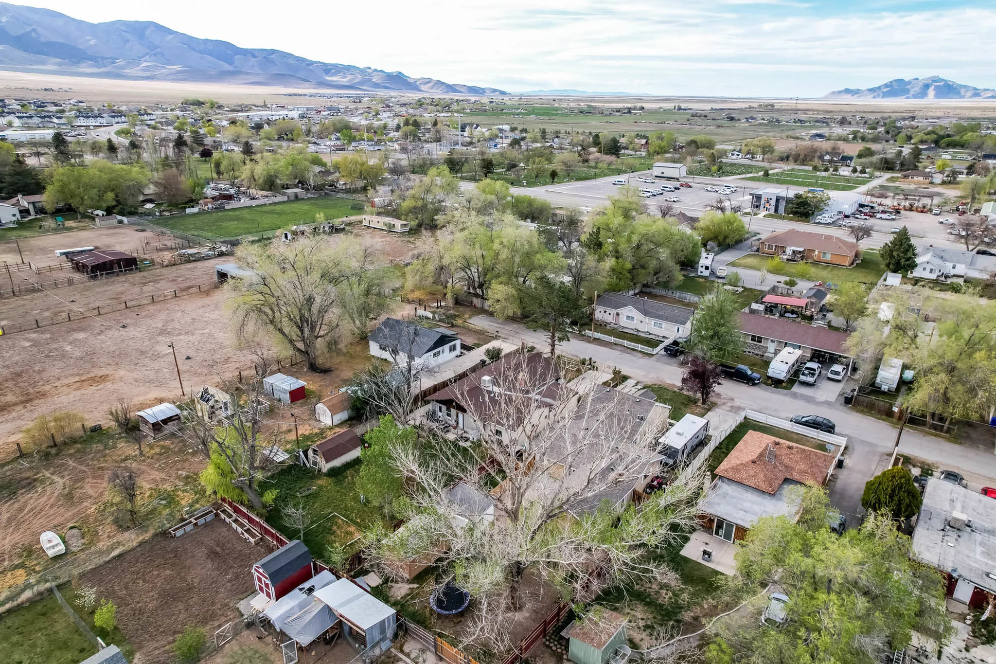 Aerial view of residential area featuring mountains