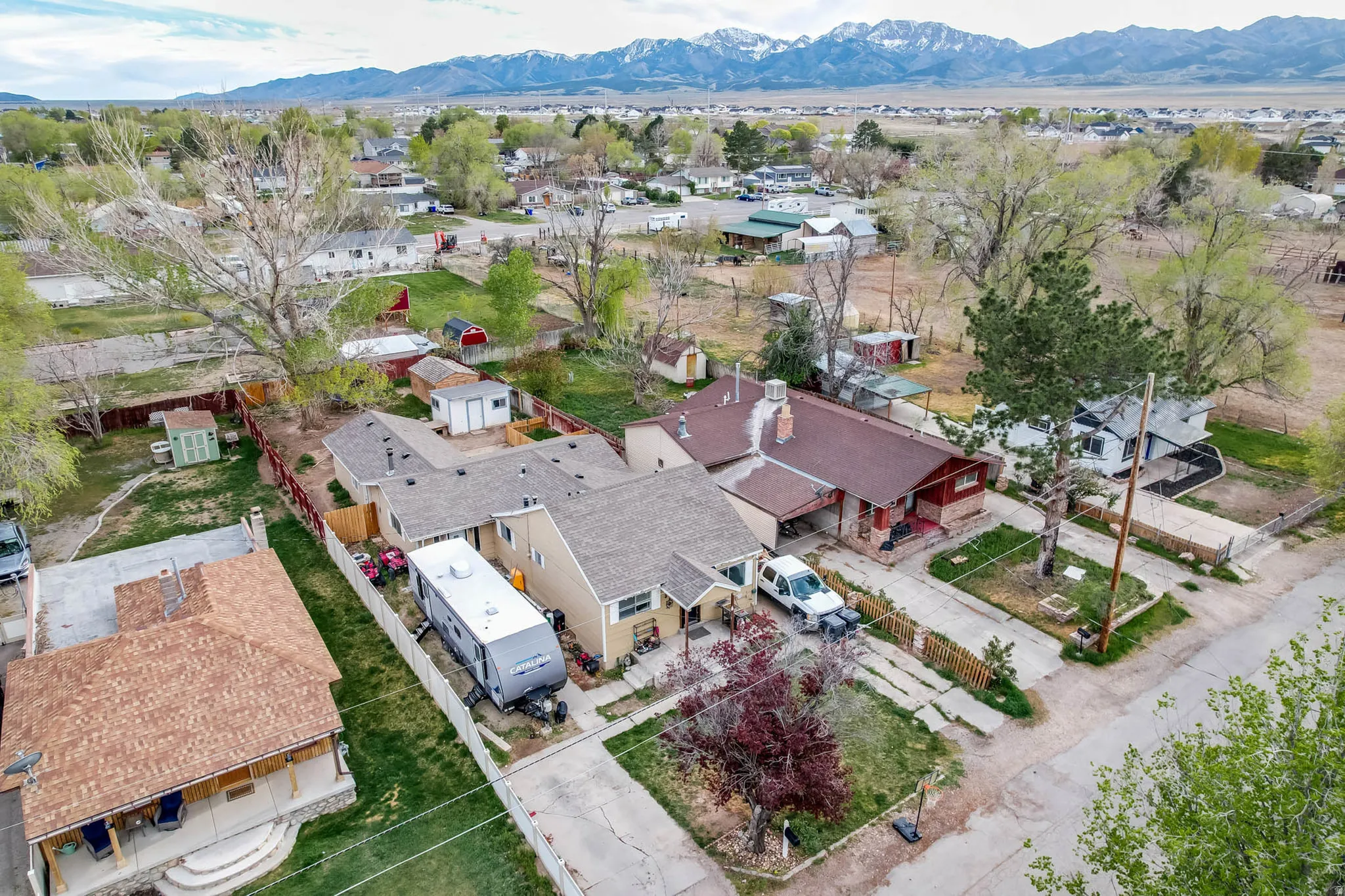 Aerial perspective of suburban area with mountains