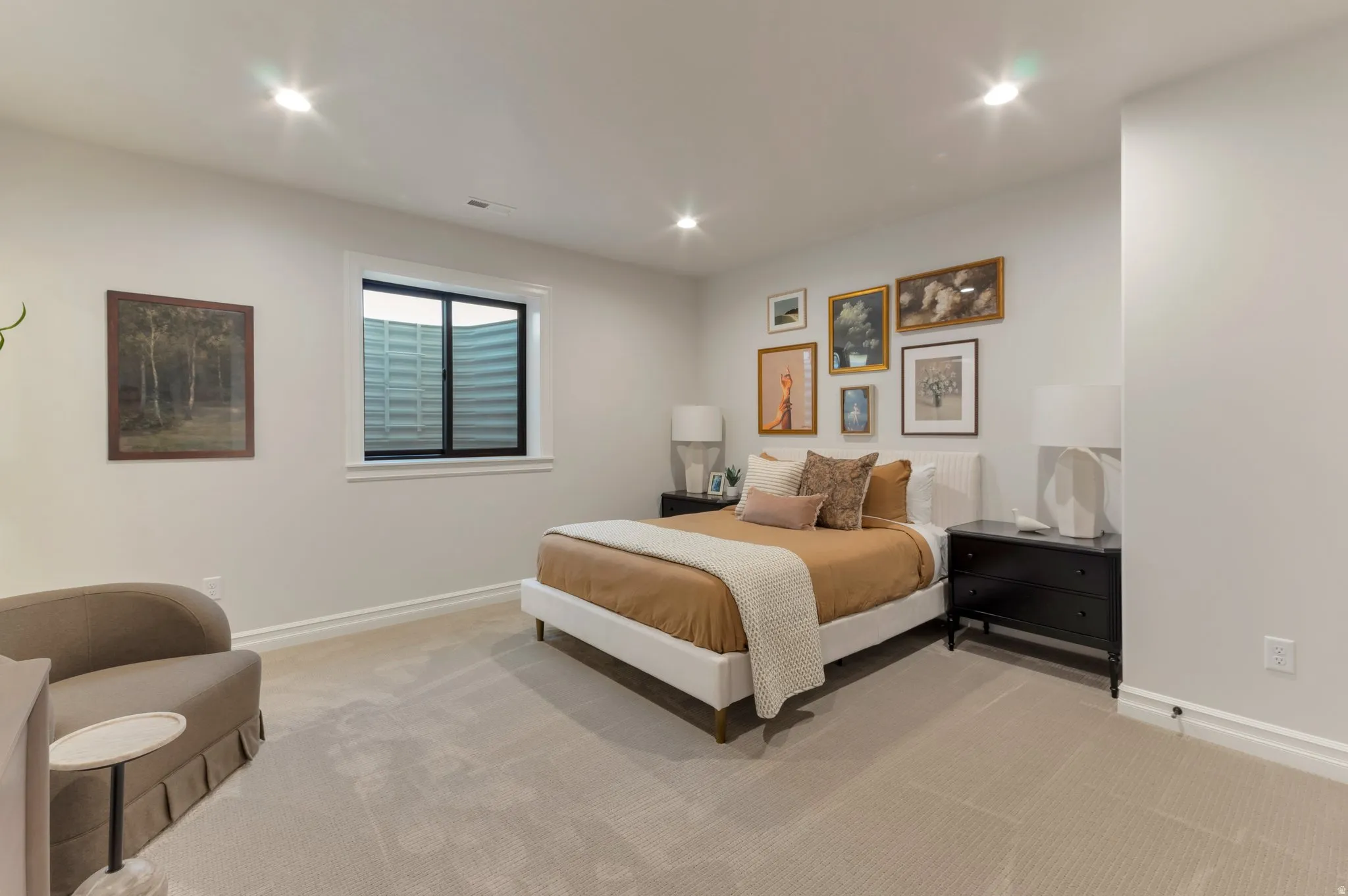 Bedroom featuring recessed lighting and light carpet