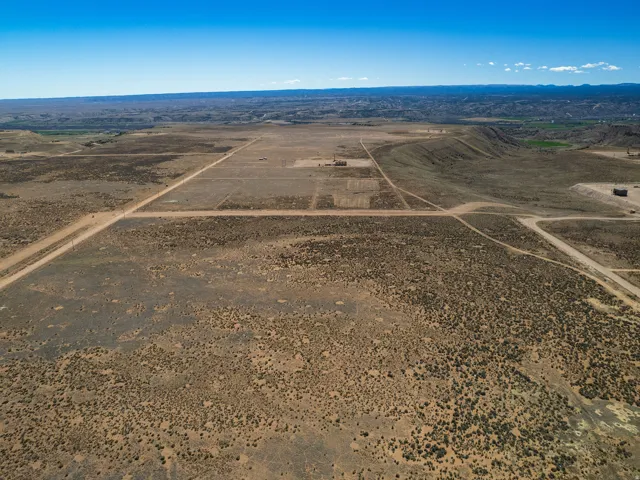 Aerial view of sparsely populated area featuring a desert landscape