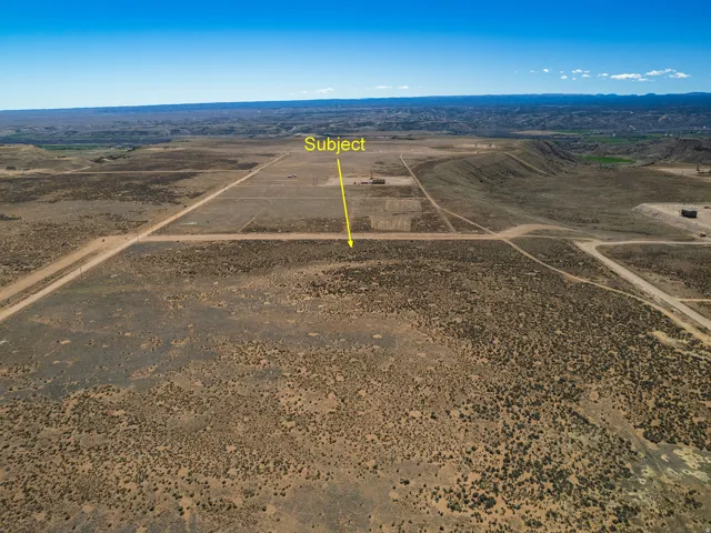Aerial view of sparsely populated area with a desert landscape