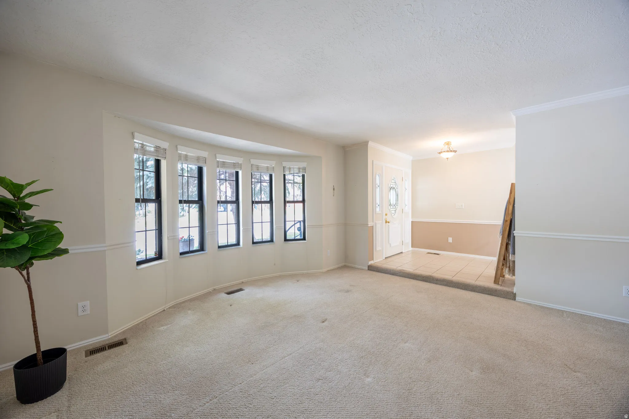 Formal living room perfect for a piano or reading room.