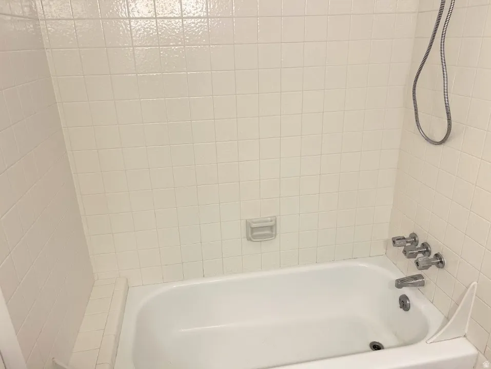 Bathroom featuring bathing tub / shower combination