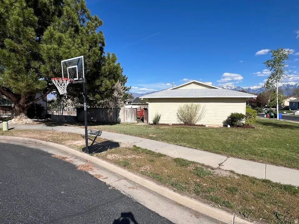 View of home's exterior with a mountain view